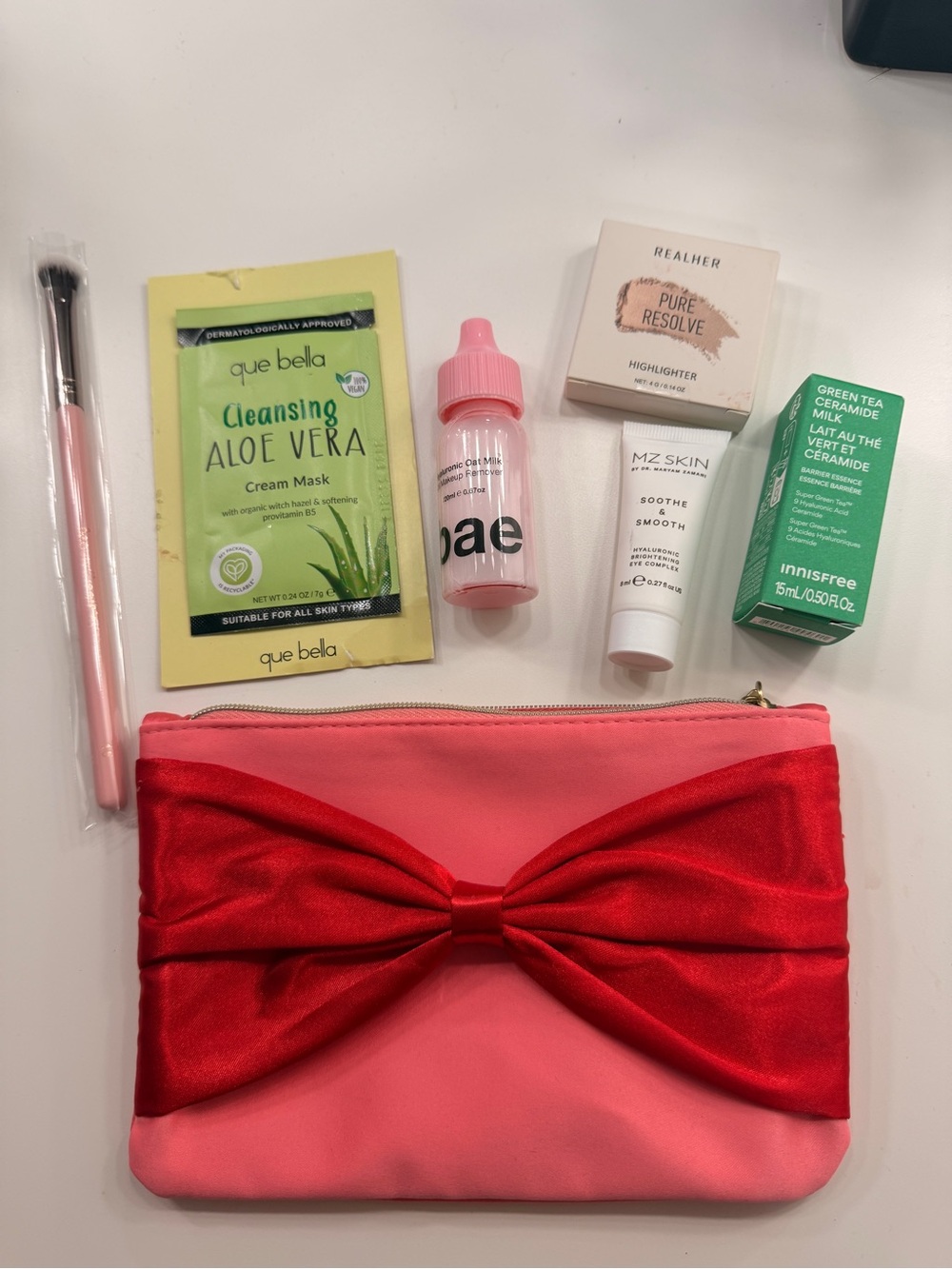 ipsy Pink and Red Bow Cosmetic Bag with Makeup Accessories